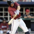 Northwest Arkansas’ Kurt Mertins connects for a double Friday during the Naturals’ game against the ...