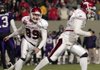  Arkansas holder Austin Tucker (left) chases kicker Alex Tejada downfield after Tejada made the game-winning field goal in overtime to defeat East Carolina 20-17 in the 2010 Liberty Bowl. Tucker is returning to Shiloh Christian to coach running backs. 