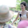 Serena Caffrey, 15, talks to a group of area residents Sunday about the garden she works with at the...