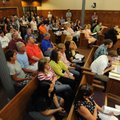 A large crowd fills the council chambers during a meeting of the Fayetteville City Council Tuesday, ...
