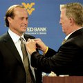 FILE - In this Dec. 22, 2010 file photo, new West Virginia offensive coordinator and coach-in-waitin...