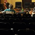 Property Owners Association board members George DeGroot, left, Jim Parsons, second right, and Steve...