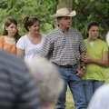 Olivia Weathers, 13, from left, Jerri Weathers, Mark Weathers and Audra Weathers, 11, stand together...