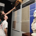 LIBRARY OF CONGRESS Destine Bennett and Cameron Bennett, 7, study a display Friday about Thomas Jeff...