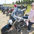 Georgia Brooks of Fayetteville, a member of the Chrome Divas, a local women-only motorcycle club, di...