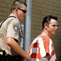 Mark Krause is escorted to a sheriff’s vehicle outside the federal courthouse in Harrison on Monday,...