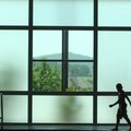A child walks along the side of the pool at the Donald W. Reynolds Boys & Girls Club in Fayetteville...
