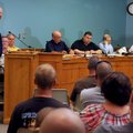 Dean Bitner, left, with the Springdale Firefighters local union, addresses members of the Springdale...
