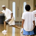 Ron Brewer Sr. offers instruction Monday to children who are participating this week in the fifth Br...