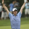 Rory McIlroy, of Northern Ireland, reacts to his eagle on the eighth hole during the second round of...