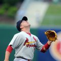  Springfield third baseman Zack Cox tracks a pop fly against Northwest Arkansas, which he caught for...