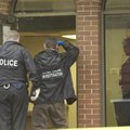  Fayetteville police detective Mike Hammons, from left, crime scene investigator John Brooks and Sgt...