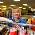 Kimberly Stevens enjoys helping people at the Goodwill Industries store she manages in Bentonville....