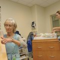  Soothing harp music from the fingers of Brenda Bowen Cox is heard in several areas of the hospital,...
