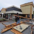  Jimmy Boggs of Oklahoma City works Thursday at Braum’s at 907 S. Thompson St. in Springdale. Both S...