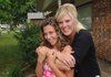  Beth Main hugs her daughter Kayla, 13, at their Springdale home. Main, a nurse, is a single mom in the Single Parent Scholarship Fund program. “If I was going to better my family, I had to go back to school,” Main said.