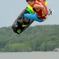 Sean Steele of Fayetteville spins above Beaver Lake in an Outlaw Class exhibition in the Hypertour W...