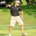 Rob Adair celebrates sinking an eight-foot putt on the 18th green to win the Pinnacle Member-Guest T...