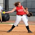 Fayetteville’s Megan Newberry pitches for the West against the East in the Arkansas High School Coac...