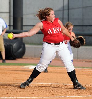 Fayetteville’s Megan Newberry pitches for the West against the East in the Arkansas High School Coaches Association All-Star Softball Game on Monday at Bogle Park in Fayetteville. West defeated East 4-0 in the first game of a doubleheader.