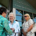 Tommie Hensen, from left, chats with Pat Walker and Carrie Eggart on Monday after the grand opening ...