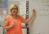 Laura Kent, an associate professor of secondary education at the University of Arkansas at Fayetteville, talks during a training session for area elementary school teachers last week. The session at Rogers High School was geared at helping teachers transition to new, common core educational standards.