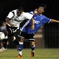 The West’s Pablo Castillo, left, of Siloam Springs breaks past the the East’s Williams Hidalgo of Ca...