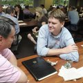 Jim Shankle, left, talks with Chris Hass about their passions before participating in a panel discus...