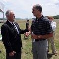 Ray Boudreaux, director of the Fayetteville Executive Airport, left, talks with Jerry Chism, assista...