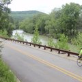 The Mulberry River flows beside Arkansas 215 to create one of the most scenic bicycle rides in the s...