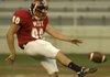  Gravette’s Cody Montee punts for the West team Thursday during the Arkansas High School Coaches Association All-Star Football Game in Reynolds Razorback Stadium in Fayetteville.
