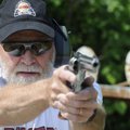  Roger Reid, of Bentonville, poses with his Ruger revolver at a private range on Friday, June 17, 20...