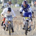 Travis Talburt of Pea Ridge, left, and Jason Ellinger, 17, of Lowell compete for lead position in t...