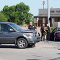 Springdale Police officers work the scene of a two car accident Friday June 24, 2011 at Sunset Avenu...