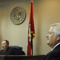  Circuit Judge David Clinger, left, discusses a criminal case with attorneys in his courtroom Wednes...