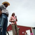 Jeff Marley listens as University of Arkansas professor Susan Watkins talks Tuesday about energy eff...