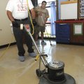 Luis Gamboa, left, and Eduardo Rojas clean classroom floors Wednesday at Grace Hill Elementary Schoo...