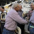 Rodeo of the Ozarks board members, in plaid from left, Steve Smith, Jerry Biazo and Tex Holt pay the...