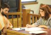  Britain Coy Smith of Springdale, left, speaks Thursday with public defender Leana Houston before being arraigned on second-degree murder charges in Washington County Circuit Court in Fayetteville.