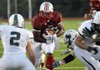 Jefferson City Jay Kody Walker takes the ball in for a touchdown against Rock Bridge Friday at Adkins Stadium. To view this and other photographs, please visit www.newstribune.com/photos.