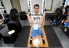 Springdale Har-Ber junior receiver and tight end Nic Byrne goes through a light workout in the team’s weight room Thursday in Springdale.