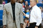 Tulsa Shock coach Nolan Richardson, left, is motioned back to the bench by assistant coach Wayne Stehlik after Richardson was called for a technical foul in the second quarter of a WNBA game against the Minnesota Lynx on Thursday, June 30, 2011, in Tulsa, Okla. (AP Photo/Tulsa World, Jeff Lautenberger)