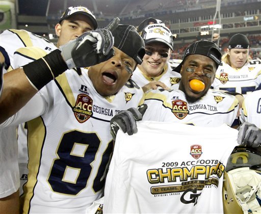 file-this-dec-5-2009-file-photo-shows-players-from-georgia-tech-including-daniel-mckayhan-left-and-embry-peeples-right-celebrating-techs-39-34-win-over-clemson-in-the-atlantic-coast-conference-championship-ncaa-college-football-game-in-tampa-fla-the-ncaa-has-put-georgia-tech-on-four-years-of-probation-and-fined-the-school-100000-for-violations-in-the-football-and-mens-basketball-programs-ap-photomike-carlson-file