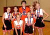 Gravette All-American cheerleaders, back row, Taylor Eaton, Kayla Holliday, “Leo the Lion” Sayer Smith, Candace Pembleton and Meghan McAfee. Front row, A.J. Clabon and Micayla Hendricks.
