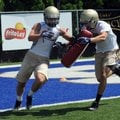 Shiloh Christian’s John Johnson, left, and Austin Huett participate in a drill during practice on Tu...