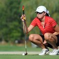 Springdale senior Kara Kelsey lines up her putt during the Springdale Invitational on Tuesday at the...