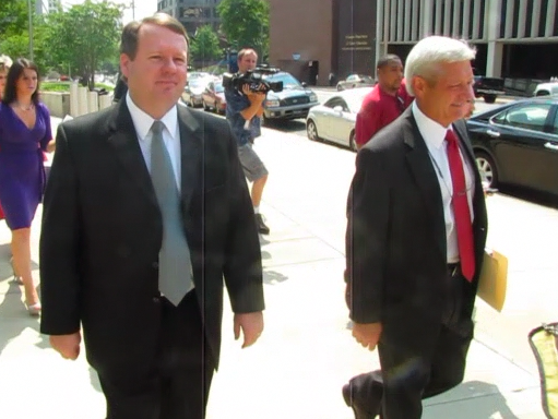 kevin-lewis-left-stays-silent-as-reporters-pepper-him-with-questions-wednesday-lewis-was-leaving-the-us-district-courthouse-in-little-rock-after-pleading-guilty-to-a-crime-prosecutors-called-the-worst-fraud-in-state-history