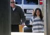  Detective Tom Boyle, left, with the Bentonville Police Department, escorts Huong Thi Truong, 28, of Bentonville, to a bond hearing Friday, Aug. 12, 2011, in Judge GreenÕs court at the Benton County Courthouse. Truong, was arrested in connection with the felony first-degree murder of Minh Van Trinh.
