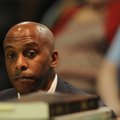 Raymond Douglas looks at potential jurors Aug. 15 before his trial for murder of his former mother-i...