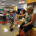 Hayden Sexauer, a kindergartner at Butterfield Trail Elementary School in Fayetteville, learns Monda...